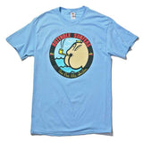 Close-up of light blue Butthole Surfers Pee Pee the Sailor t-shirt featuring the album cover artwork on a white background.