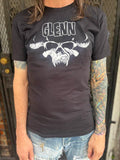 Glenn Danzig Logo black t-shirt featuring the black and white horned skull logo along with the word 'Glenn' in the classic logo lettering, on a model.