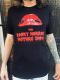 Rocky Horror black t-shirt featuring the large lips logo and words 'The Rocky Horror Picture Show' in large red blood dripping text, on a model.