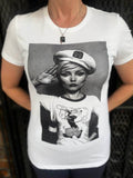 Debbie Harry Blondie Popeye Salute white t-shirt featuring an image of Debbie wearing a t-shirt with an image of Popeye on it while she salutes, photographed on a model.
