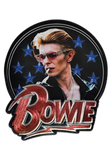 Circular embroidered patch featuring a portrait of David Bowie wearing sunglasses, with blue stars on a black background and the word 'BOWIE' in large red letters at the bottom.