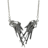 A silver-toned metal pendant necklace featuring Edward Sissorhands hands touching and suspended from a matching chain.