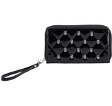Black patent leather wristlet clutch with a diamond-quilted pattern and silver Frankenstein head embellishments, featuring a matching black wrist strap.