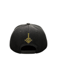 Back of black Ghost baseball hat with a yellow logo symbol on the back,  displayed on a transparent background.