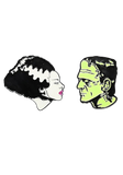 Enamel pin set featuring the heads of Frankenstein in green and his Bride in black and white with pink lips.