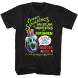 Close-up of Captain Spaulding's Museum of Monsters black t-shirt featuring an illustration of his head from the movie along with green text for 'Captain Spaulding's Museum of Monsters and Madmen', displayed on a white background.