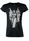 Black t-shirt with a graphic design of Lily Munster wearing a winged cape in slightly distressed white.