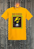 Bad Brains Banned in DC yellow t-shirt featuring artwork from the album and the band name logo in red, green, and yellow text, displayed in front of a metal gate background.