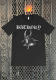 Front of Bathory Us Debut Album black t-shirt featuring artwork from the album, displayed on a metal gate background.