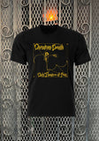 Christian Death Only Theatre of Pain black t-shirt featuring album artwork, displayed on a metal gate background.