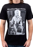 Dolly Parton Guitar black t-shirt featuring a black and white framed image of her posing with her guitar and white text 'Dolly Parton' above the image, photographed on a model on a white background.