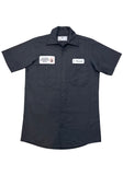Black button down work shirt featuring an embroidered patch with a white background and black script 'F. Krueger' on the left breast and an embroidered patch with a white background and black text 'Elm Street Neighborhood Watch' on the right breast, on white background.