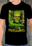 Frankenstein Monster Among Us Japanese black t-shirt featuring a green image of Frankenstein's head over an image of the monster on the table with the Dr and Japanese characters in green with red outlines underneath the image, on a model against a metal gate background.