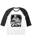 Johnny Cash Finger white raglan t-shirt with black 3/4 sleeves featuring a black and white image of him holding up his middle finger while on guitar and 'Cash' in large black text under the image, displayed against a white background.