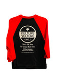 Back of Kulture Vulture black raglan t-shirt with red 3/4 sleeves featuring the circular store logo and text "This is the store for serious music fans. 523 Rue Dumaine Between Decatur and Chartres" along with the website URL, photographed on a white background.