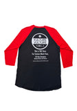 Back of Kulture Vulture black raglan t-shirt with red 3/4 sleeves featuring the store circular logo and white text "This is THE Store for Serious Music Fans.  523 Rue Dumaine Between Decatur and Chartres  www.kulutrevulturenola.com", displayed on a white background.