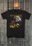 Iron Maiden The Number of the Beast black t-shirt featuring album artwork, displayed against a metal gate background.