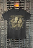 A black Iron Maiden band t-shirt featuring a large beige and brown Egyptian pharaoh graphic with hieroglyphs, displayed against a decorative metal mesh background.