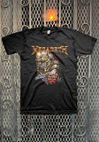 Megadeth Peace Sells black t-shirt featuring album artwork along with red text 'Peace sells but who's buying' under the golden band logo on the left of the image, displayed against a metal gate background.