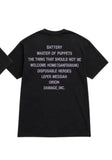 Back of Metallica Master of Puppets black t-shirt featuring text 'Battery Master of Puppets The Thing That Should Not Be Welcome Home (Sanitarium) Disposable Heroes Leper Messiah Orion Damage, Inc.', displayed on a white background.