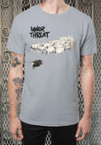 Minor Threat Sheep grey t-shirt featuring album artwork from Out of Step, on a model against a metal gate background.