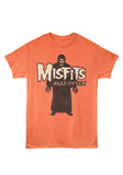 Misfits Crimson Ghost Halloween orange t-shirt featuring a large band logo and the word Halloween in white letters on top of a black and white Crimson Ghost figure illustration, displayed on a white background.