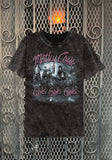 Motley Crue Girls, Girls, Girls acid rinse black t-shirt featuring artwork from the album, displayed on a metal gate background.