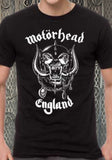 Front of Motorhead England black t-shirt featuring album artwork, on a model against a metal gate background.