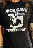 Black Nick Cave and the Bad Seeds Tender Prey t-shirt featuring the album cover artwork, on a model against a metal gate background.