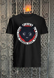 The Pixies Good Friends black t-shirt featuring album artwork, displayed against a metal gate background.