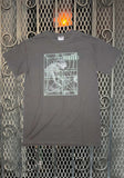The Pixies Doolittle grey t-shirt featuring the album artwork, displayed on a metal gate background.