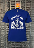 Blue Ace Frehley Shock Me t-shirt featuring an image of Ace in white and the words 'Shock Me' and 'Make Me Feel Better' in white text, on a metal gate background.