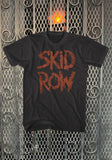 Front of Skid Row Slave to the Grind '91 Tour black t-shirt featuring the band name in large distressed brick red lettering, displayed on a metal gate background.