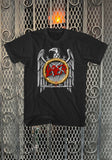 A black short-sleeve t-shirt featuring a large graphic print of the band Slayer's logo, an eagle, and a golden chain, displayed against a decorative metal gate background.