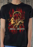 Slayer Hell Awaits black t-shirt featuring album artwork, on a model against a metal gate background.