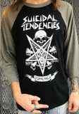 Suicidal Tendencies Possessed black raglan t-shirt with grey 3/4 sleeves featuring the album artwork, photographed on a model in front of a metal gate background.