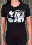 Black t-shirt with graphic design of Ozzy Osbourne and Lemmy in white on a textured wall background