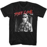 Close-up of They Live Red Roddy black t-shirt featuring the words 'They Live' in red text with white outline along with a black and white image of Roddy, displayed on a white background.