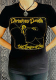 Christian Death Only Theatre of Pain black t-shirt featuring the album artwork in yellow, photographed on a model in front of a metal gate background.