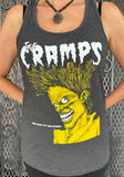 The Cramps Bad Music for Bad People heather grey tank top featuring the album artwork, photographed on a model in front of a metal gate background.