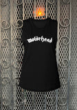 Motorhead logo black sleeveless t-shirt featuring the classic logo in white text, photographed flat in front of a metal gate background.