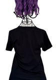 The back of a black short-sleeve crewneck t-shirt displayed on a black wire mannequin stand, against a plain white background.