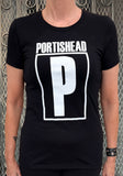 A person wearing a black short-sleeve T-shirt with a large white graphic on the front that reads "PORTISHEAD" above a bold white letter P inside a bordered rectangle.