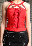 A red halter-style corset top with multiple front straps, silver-tone buckles, and ribbon lacing in the front, shown on a model against a fence background.