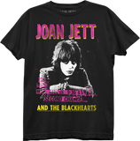 Close-up of black Joan Jett and the Blackhearts Second Chance March 15th 1981 show t-shirt featuring an image of her with large pink with yellow letters for 'Joan Jett' at the top and yellow letters for 'and the blackhearts' at the bottom, with pink knockout text for the second chance venue info in the middle, on a white background.