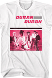 Close-up of Duran Duran Debut Record white t-shirt featuring artwork from the album in pink, black, and white, displayed on a translucent background.
