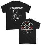 Front and back of Bathory Us Debut Album black t-shirt featuring the album artwork on the front and a pentagram with red text listing the songs and who produced them along with '1984' on the back, displayed on a white background.