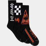 Three black socks with Def Leppard logo.  One sock has just the logo in white text, one has a black and white checkerboard on the top and logo in red and orange text, and the last one has the logo in red and orange on the foot with a red and yellow stripe and on the top in an orange triangle.