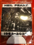 Rush Neil Peart RIP coozie featuring a black and white image of him on the drums with his name across the top and the dates "1952-2020" across the bottom in black and white text, photographed in the clear cellophane packaging.