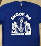 Close-up of blue Ace Frehley Shock Me t-shirt featuring an image of Ace in white and the words 'Shock Me' and 'Make Me Feel Better' in white text.